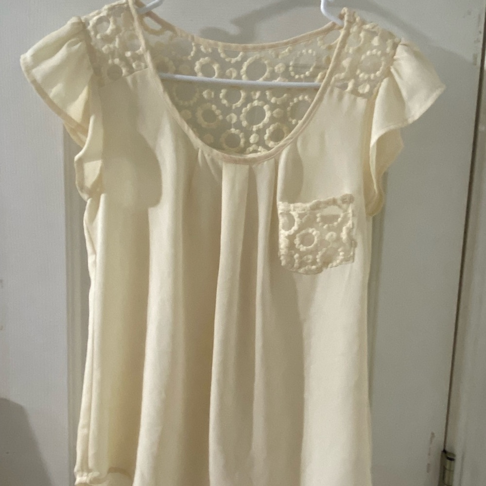 Cream colored silky short sleeve white blouse